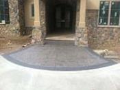 Stamped Entry Way with Stone Pillars
